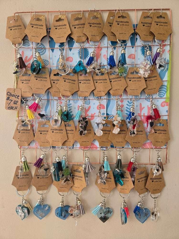 Assorted fossil keychain; natural specimen with metal key ring