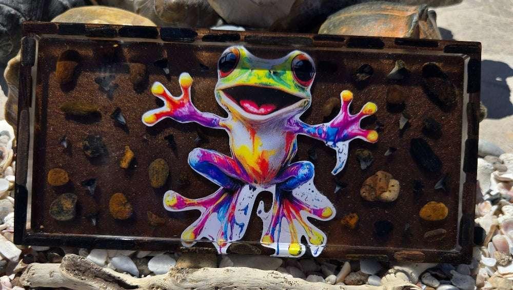 Resin tray with playful frog motif and fossil accents