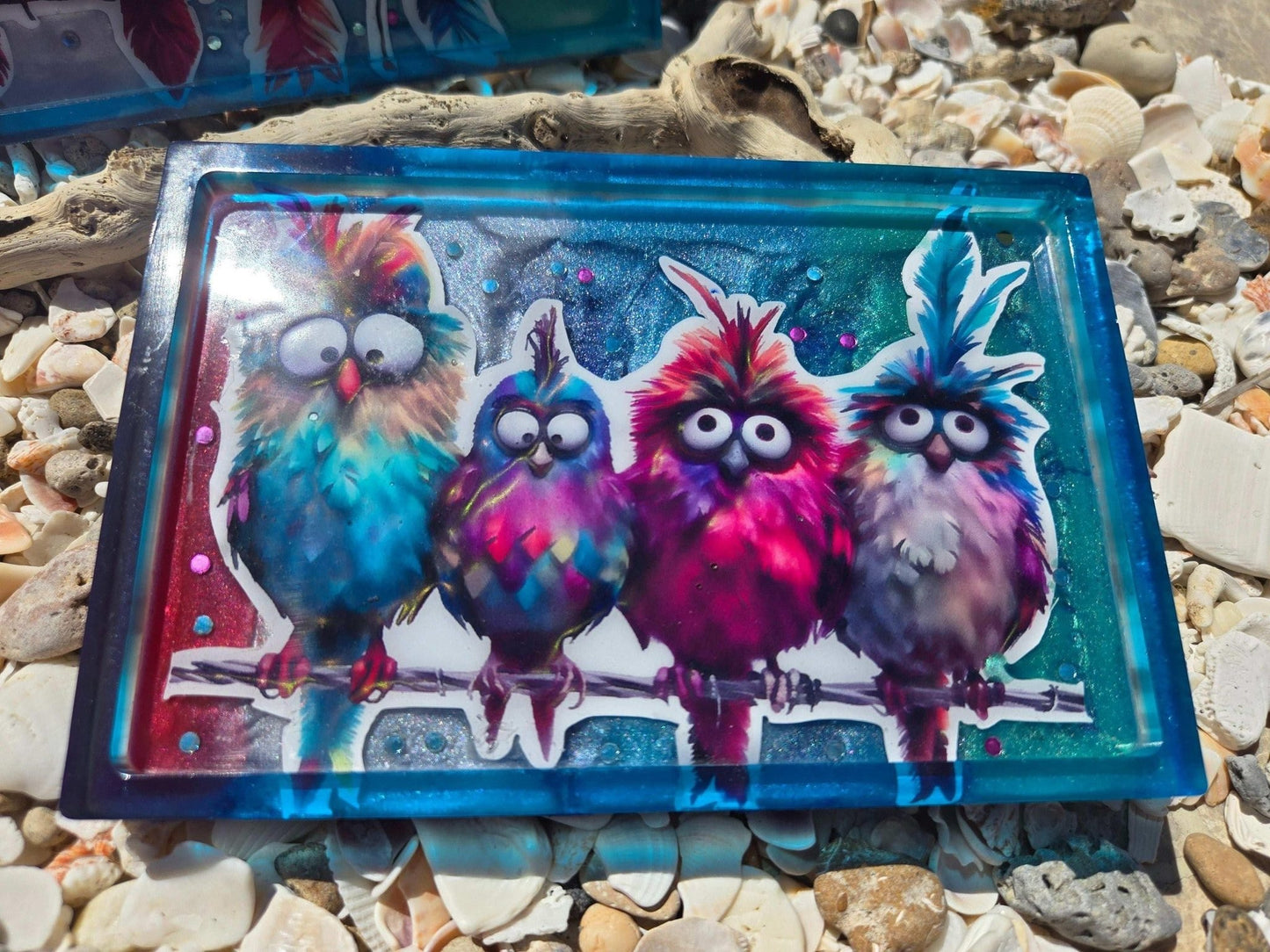 Set of two resin trinket trays with sunny bird motifs
