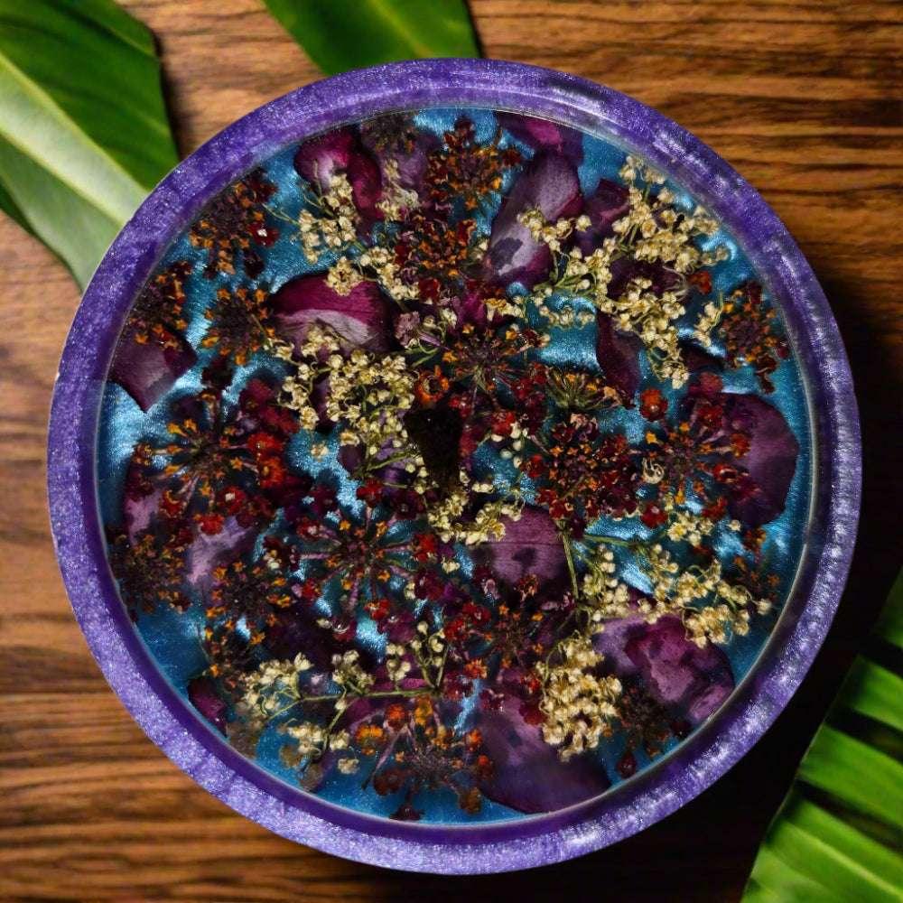 Resin coaster with floral bloom design, glossy coastal accent