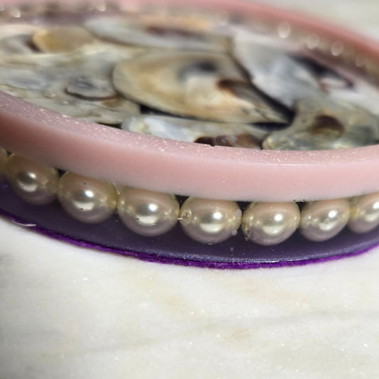 Sideview Pearl and Oysters