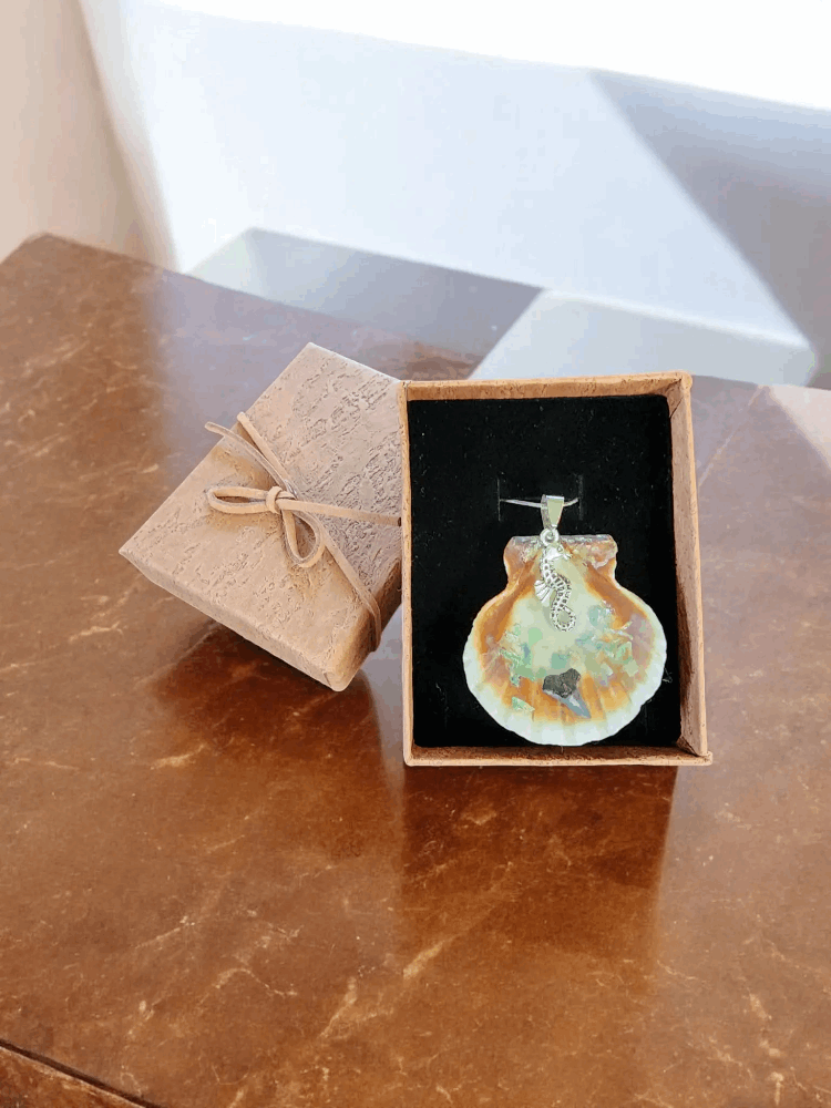 Seashell pendant with shark tooth, seahorse charm, and 10-inch chain, ocean inspired jewelry, handmade coastal accessory.