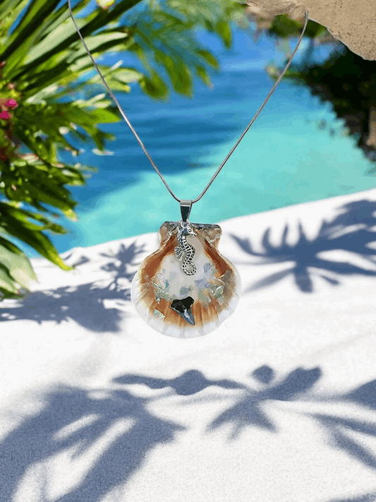 Seashell pendant with shark tooth, seahorse charm, and 10-inch chain, ocean inspired jewelry, handmade coastal accessory.